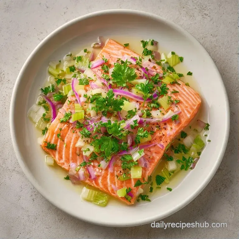 Elegant plating of seared pink fish over vibrant baby spinach with lemon wedges and a light, glistening vinaigrette.